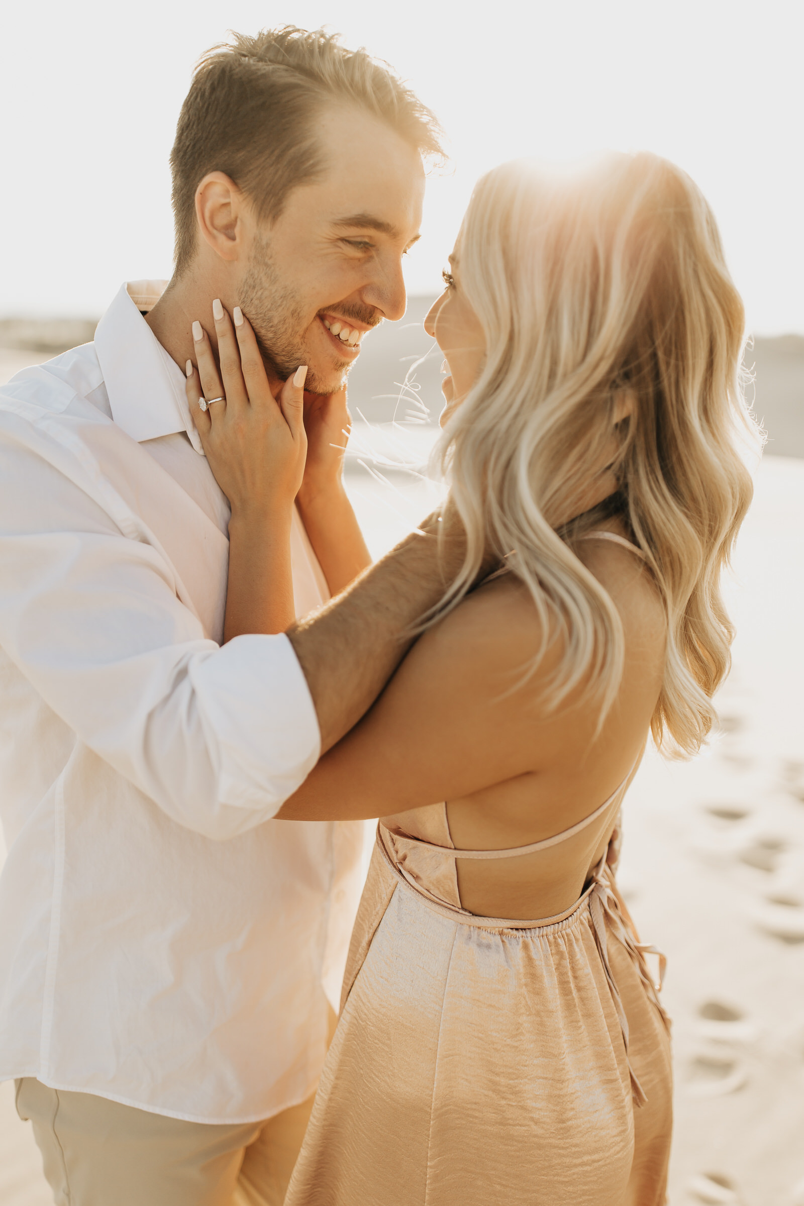 Silver Lake Sand Dune Engagement by Heather Michelle Photo